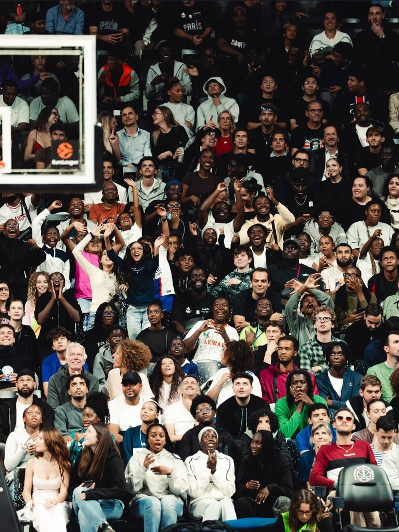 ECL Basket members in the stands of the Adidas Arena during Paris Basketball – ASVEL